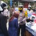 Kapolres Batu Bagikan 5.000 Masker Gratis di Pasar Besar Kota Batu