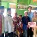 Dinsos PPPA Sampang dan Baznas Serahkan Bantuan kepada Balita Penderita Kanker Ginjal