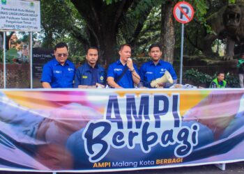Di Bawah Komando Roy Saputra Yuwono, AMPI Kota Malang Bagikan 1000 Paket Makan Siang Gratis