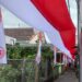 Warga Bareng Kartini Bentangkan Bendera Sepanjang 80 Meter Sambut HUT RI ke-80